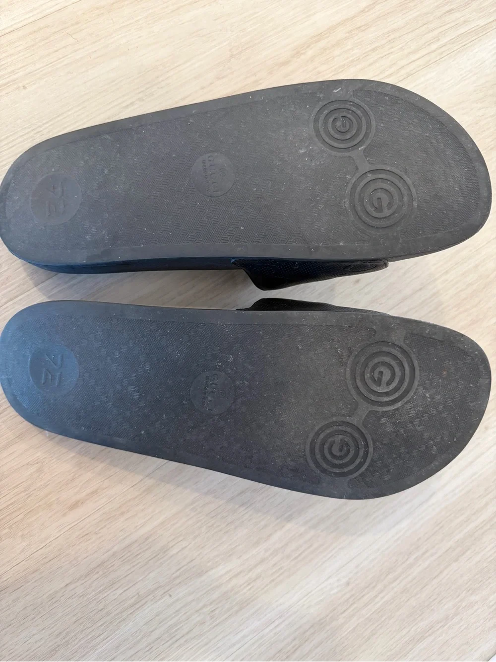 Men’s Gucci Black Embossed GG Slide Sandals